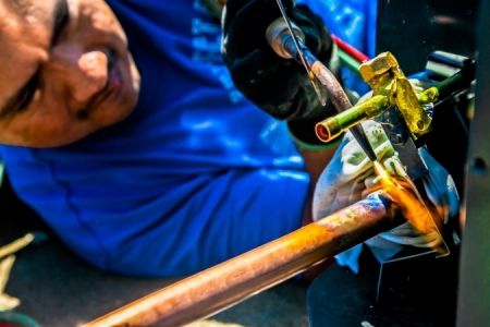 HVAC Technician Working
